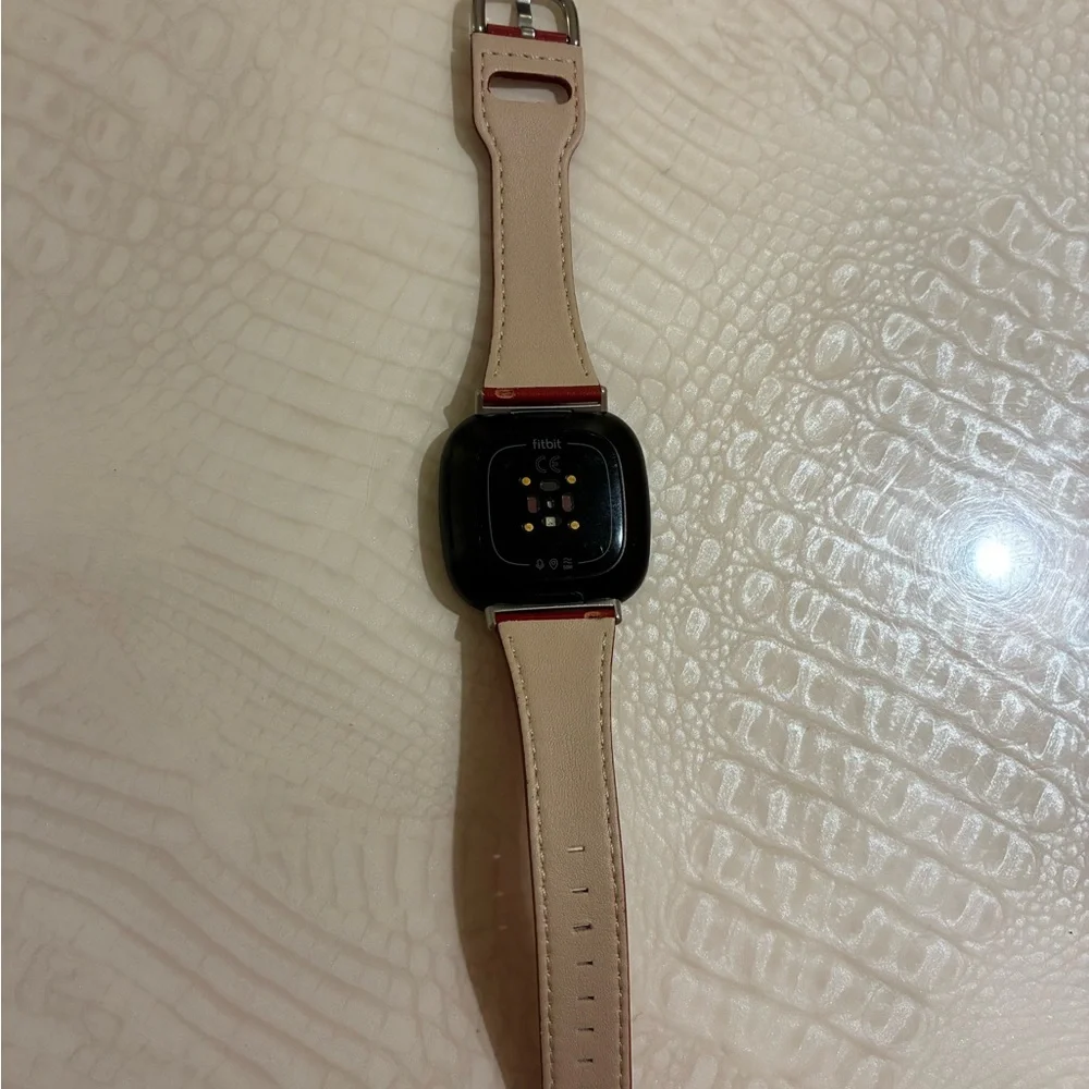 Fitbit Smartwatch with Red Strap